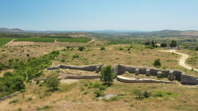 Stone ruins of ancient town of Asseria in Dalmatia, Croatia. Aerial view.