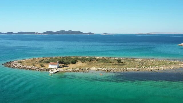 Aerial view of beautiful islands in turquoise Adriatic sea in Croatia, near town of Pakostane