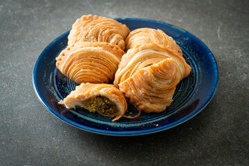 curry puff stuffed chicken on plate