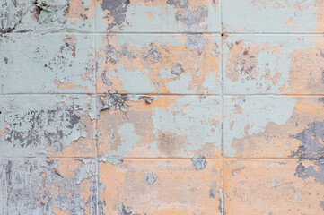 Fototapeta na wymiar Wall with peeling paint texture