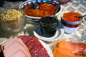 Home festive served table with red and black caviar and other different snacks