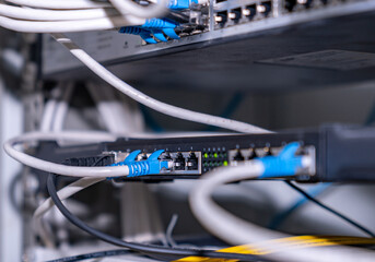 Ethernet cable on network switches background