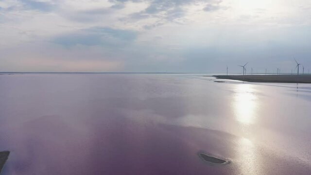 Aerial view. Lake Lemuria (Pink Lake) is a lake in the Kherson region of Ukraine. Evening time.