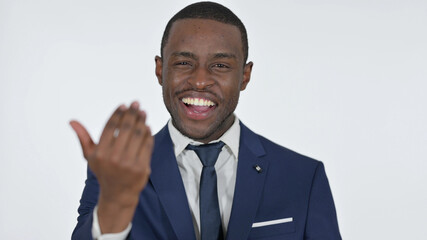 African Businessman Pointing and Inviting, White Background