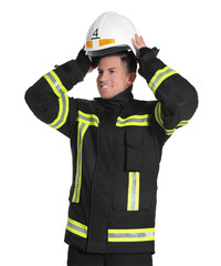Fototapeta premium Portrait of firefighter in uniform wearing helmet on white background