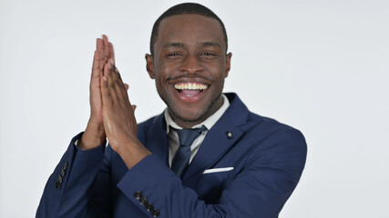 Clapping by African Businessman, White Background