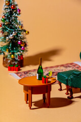 Closeup view on Christmas tree and drinks on a table in Eve night