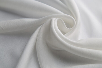Plakat Closeup shot of white swirled fabric