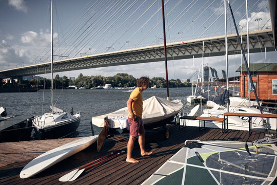 Windsurfer surfing on a windy day at the river.