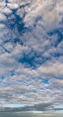 Obraz premium Fantastic clouds against blue sky, panorama