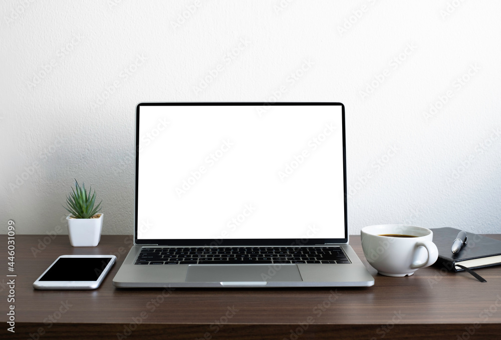 Poster wooden office desk table with keyboard of laptop computer with empty screen and phone. business and 