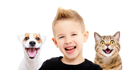 Portrait of happy smiling boy with a funny dog and a cat together isolated on white background