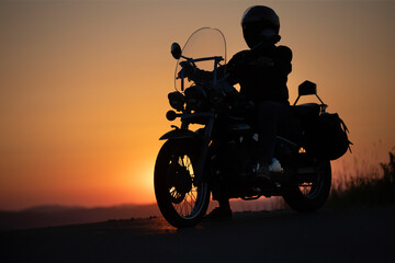 Fototapeta na wymiar Driver riding motorcycle on an empty road
