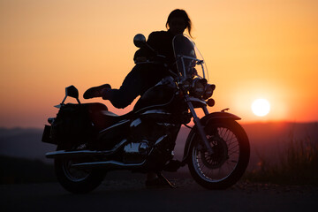 Obraz na płótnie Canvas Driver riding motorcycle on an empty road