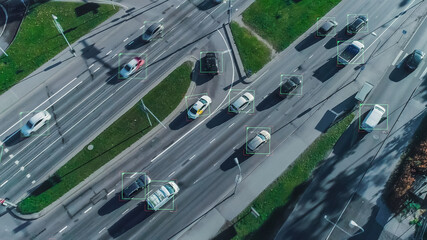 Aerial Drone Shot: Autonomous Self Driving Cars Moving On City Freeway. Concept: Artificial...