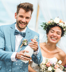 Young couple in a wedding ceremony at the beach