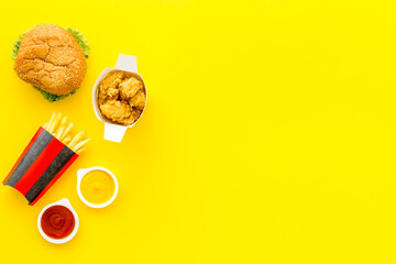 Set of fast food with hamburger and french fries. Top view