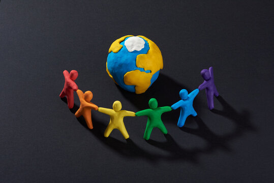 Multicultural People Around Earth. Justice And No Racism Concept. Gender And Racial Equality. DIY. Children's Crafts From Colored Plasticine. Group Of People Around The World.