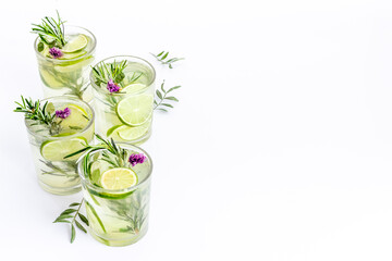Homemade herbal soda drink with lemon slices and herbs