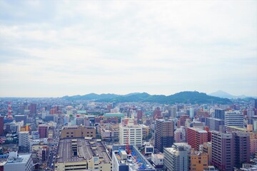 Fototapeta na wymiar Cityscape of Matsuyama city in Ehime, Japan - 日本 愛媛県 松山市 街並み