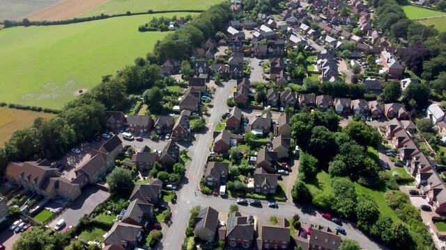 4K footage from a drone flying over houses in Chartham, Kent