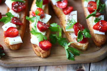 Delicious toast with strawberries and white cheese. Keto toast with strawberries.