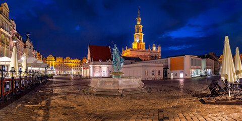 Naklejka premium Panorama of Poznan Town Hall on Old Market Square in Old Town at night, Poznan, Poland