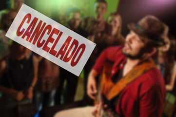 Spanish inscription CANCELED. Cancellation of concerts and festivals to prevent spreading of covid-19 virus