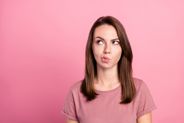 Fototapeta premium Photo of young attractive woman think hmm deep idea look empty space isolated over pink color background