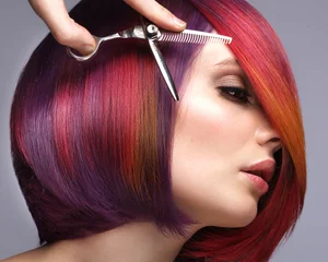 Gordijnen Beautiful woman with multi-colored hair and creative make up and hairstyle. Beauty face. © Kobrinphoto