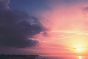 Fototapeta na wymiar Seascape in the evening. Sunset over the sea with beautiful dramatic sky