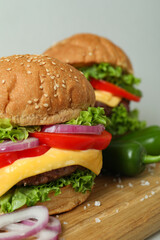 Concept of tasty food with delicious burgers