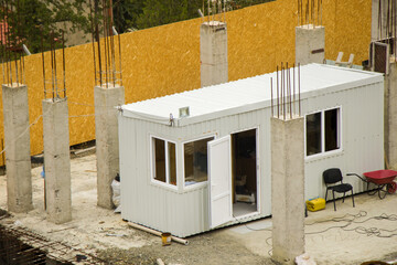 Prefabricated container cabin at the construction site