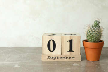 September 1 concept on gray textured table