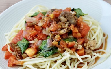 Closeup Spaghetti with Pork, Tomato and Sweet Basil