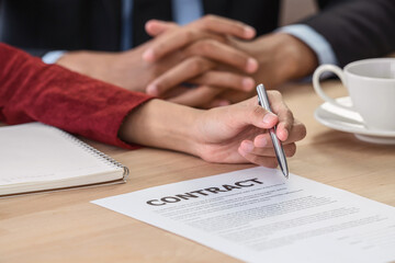 Job interview with signing contract to interviewer