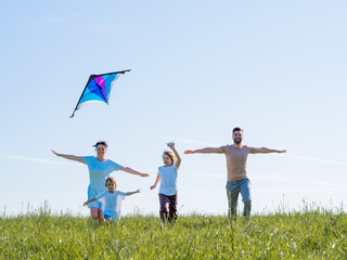 Running with kite on summer vacation