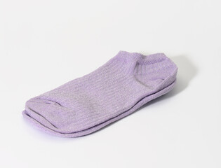 a pair of women's lilac socks on a white background