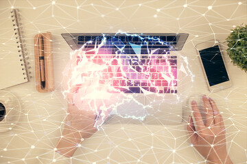 Double exposure of woman working on computer andhuman brain hologram drawing. Top View. Ai concept.