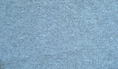 The texture of gray carpet with fine pile