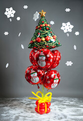 Santa Claus, snowman, christmas party balloons, tree with gifts and decorations