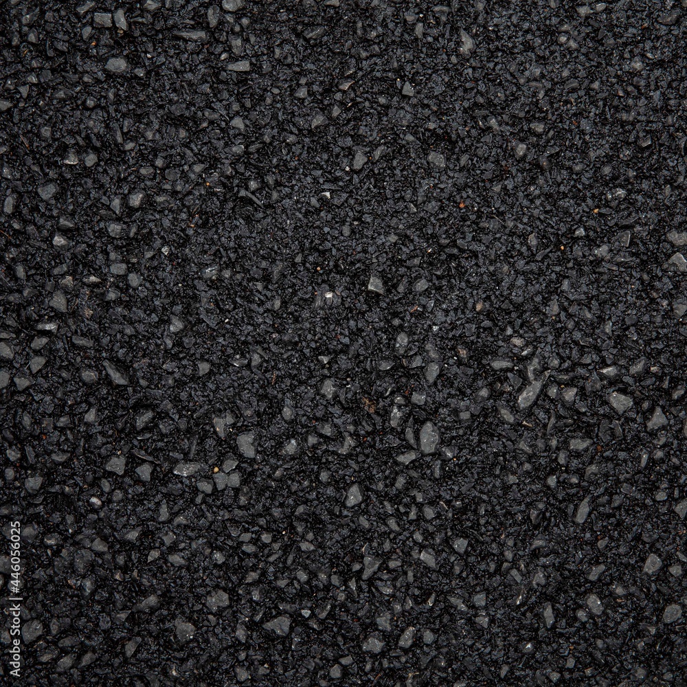 Wall mural close - up of rough black asphalt surface texture and background seamless