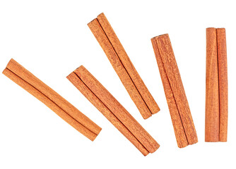 Sticks of cinnamon spice isolated on a white background, top view.
