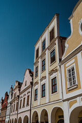 Fototapeta na wymiar Pastel colors of historic houses at the market square of Telc, Czech