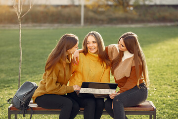 Young students sitting in a student's campus