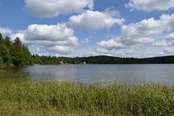 Obraz premium A lake under a cloudy sky, Sainte-Apolline, Québec, Canada
