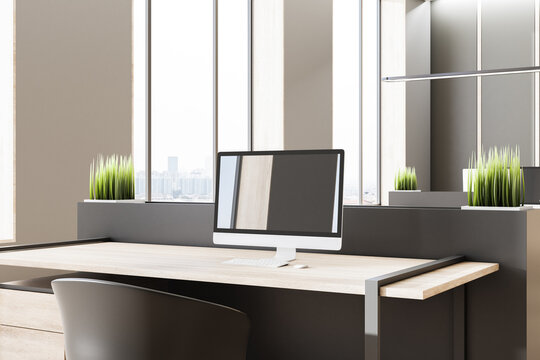 Close up of desk with empty laptop with reflections in modern office interior with window and city view. 3D Rendering.