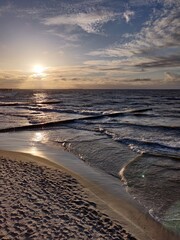 sunset on the beach baltic sea, sky and clouds
