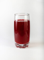 Compote of fresh cherries in a glass cup. Drinks to take away. Cherry compote on a white background.