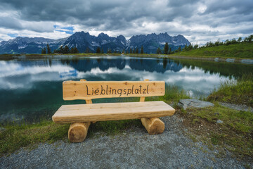 Astberg lake benach with darling little place phrase. Wilderkaiser mountains in background. Ellmau,...